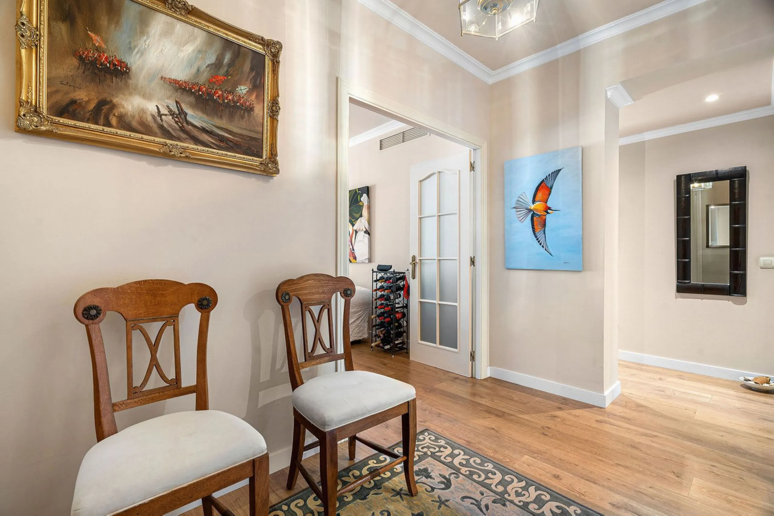 Just a short walk from the beach, this spacious two-bedroom apartment offers direct access to the beautifully maintained garden and swimming pool via a wide private terrace.