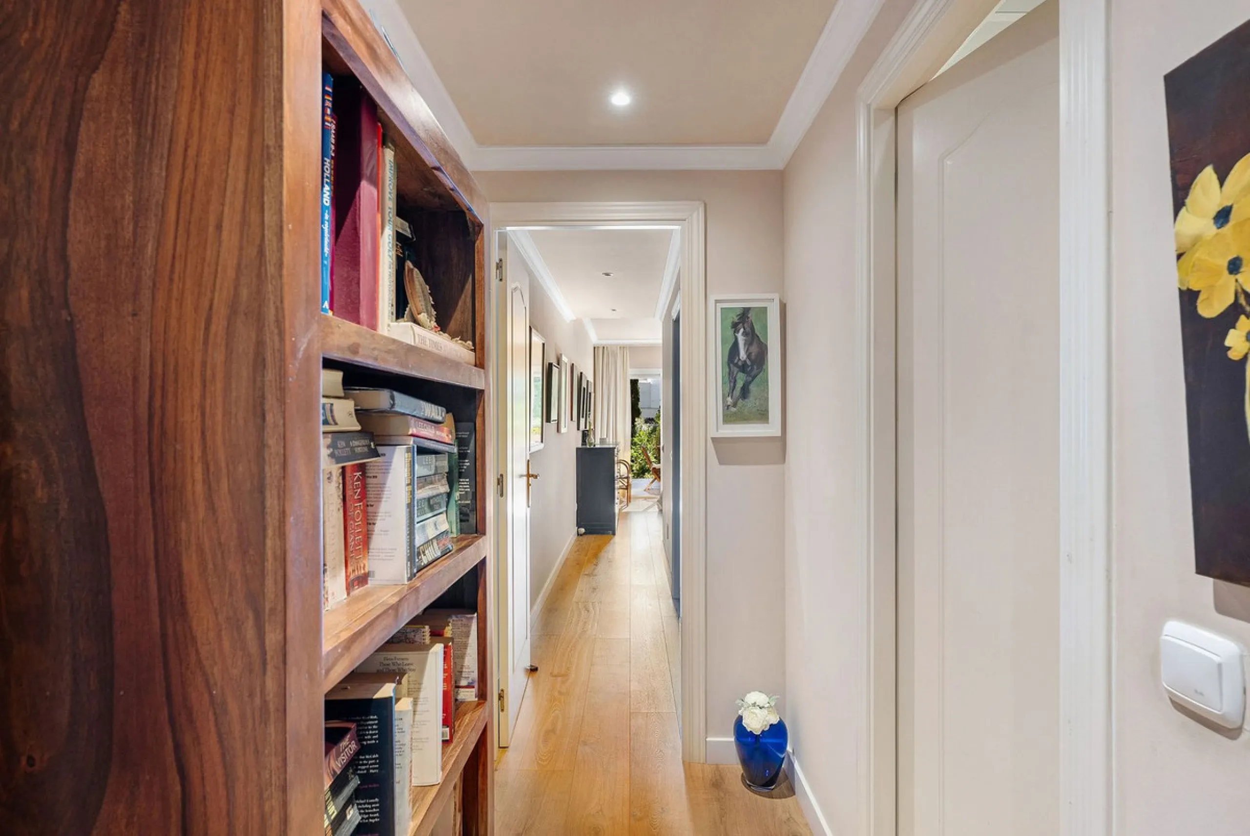Just a short walk from the beach, this spacious two-bedroom apartment offers direct access to the beautifully maintained garden and swimming pool via a wide private terrace.