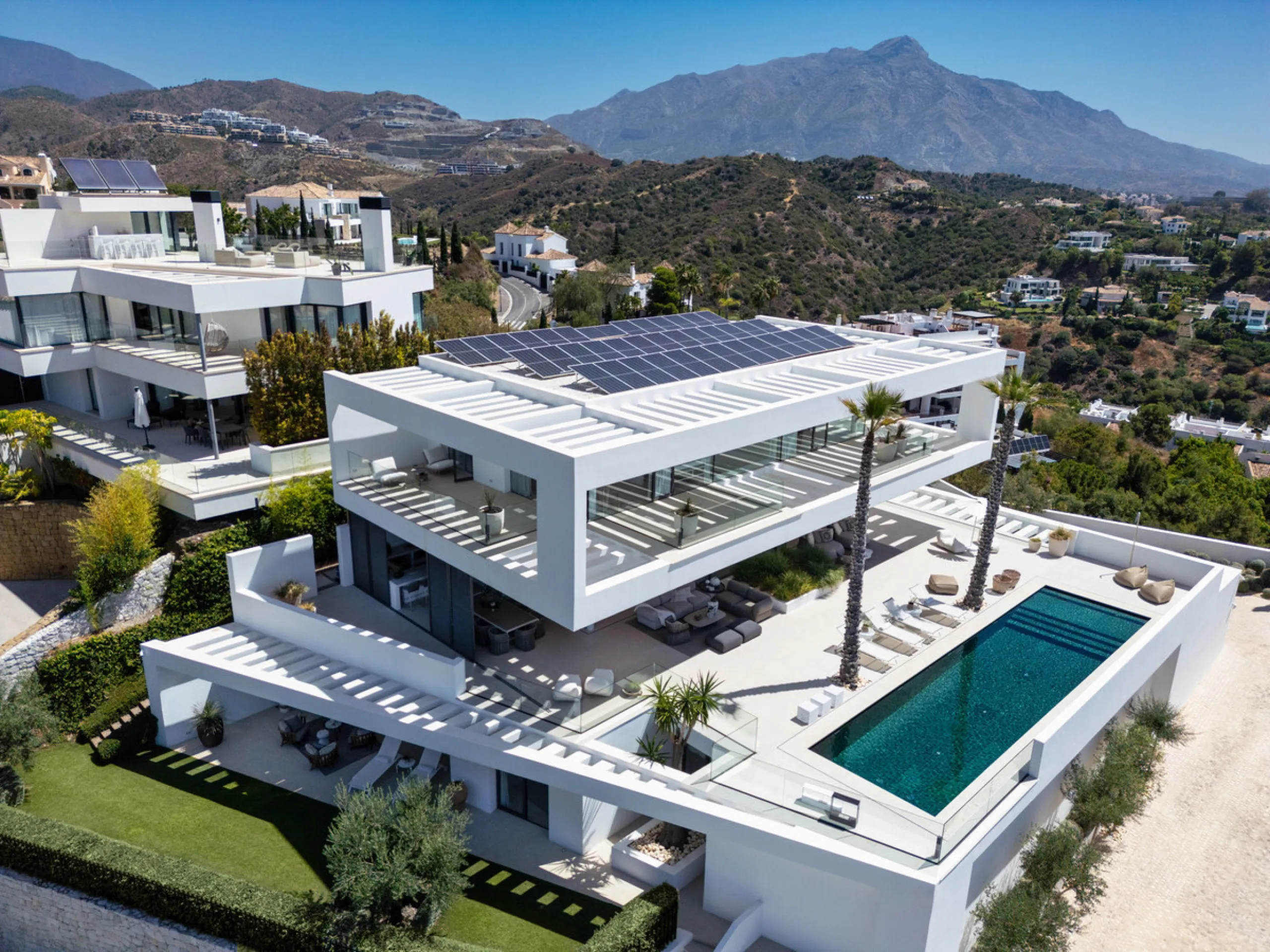 Nestled in the serene enclave of La Quinta, this contemporary villa, built in 2021, is designed to capture the essence of luxury living. South-facing, it offers stunning, sweeping views from the impressive La Concha Mountain to the Mediterranean Sea and e