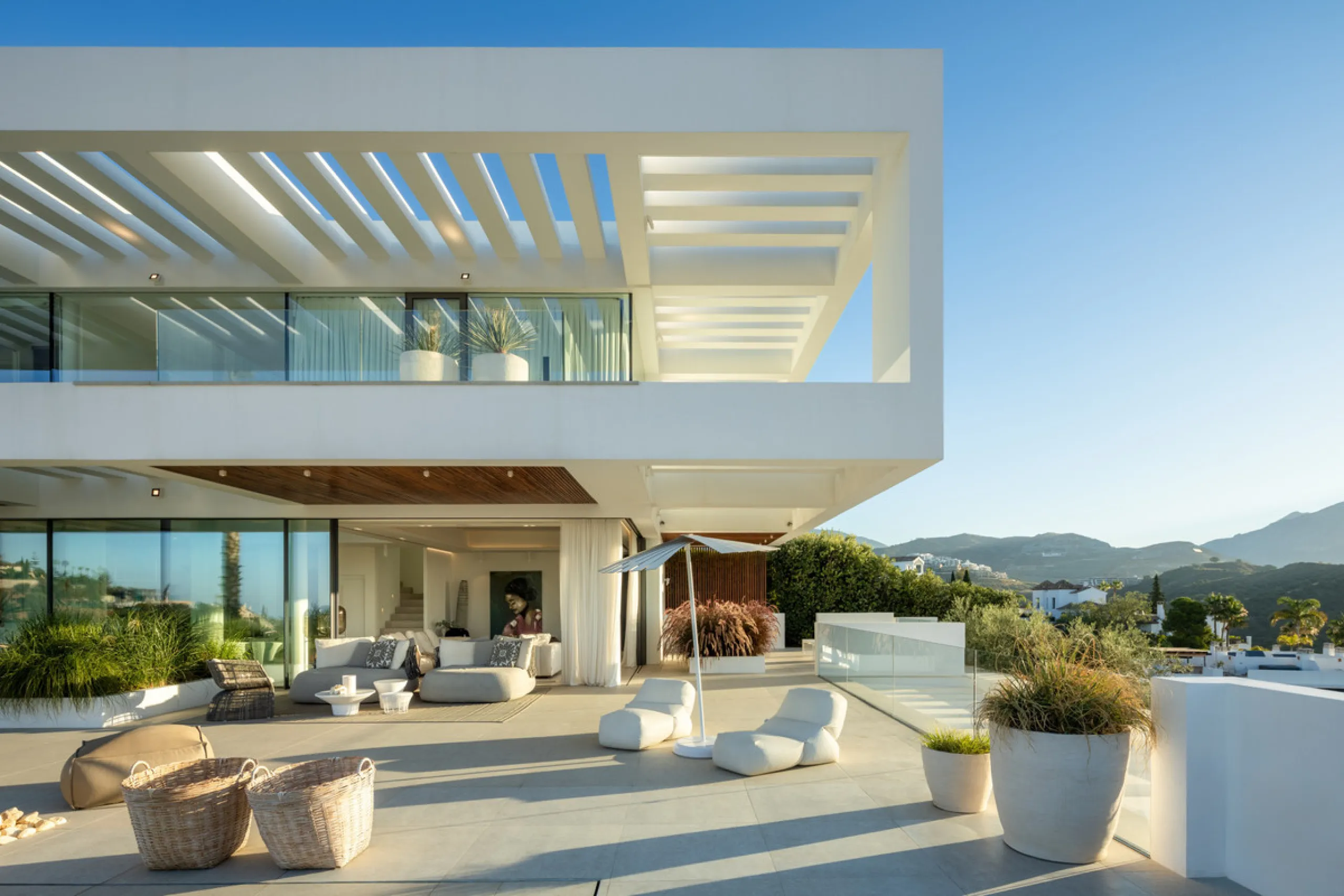 Nestled in the serene enclave of La Quinta, this contemporary villa, built in 2021, is designed to capture the essence of luxury living. South-facing, it offers stunning, sweeping views from the impressive La Concha Mountain to the Mediterranean Sea and e