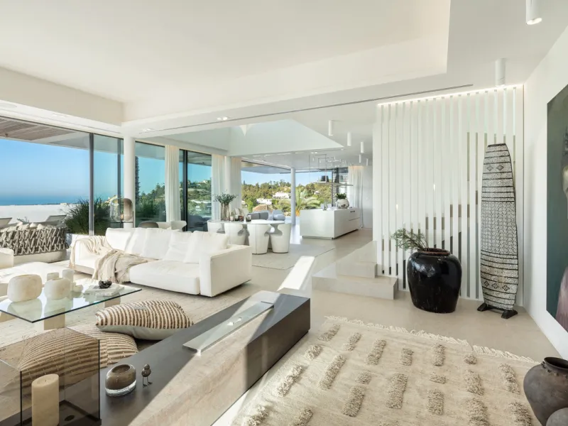 Nestled in the serene enclave of La Quinta, this contemporary villa, built in 2021, is designed to capture the essence of luxury living. South-facing, it offers stunning, sweeping views from the impressive La Concha Mountain to the Mediterranean Sea and e
