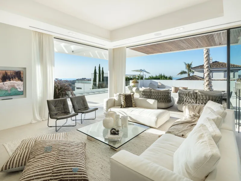 Nestled in the serene enclave of La Quinta, this contemporary villa, built in 2021, is designed to capture the essence of luxury living. South-facing, it offers stunning, sweeping views from the impressive La Concha Mountain to the Mediterranean Sea and e