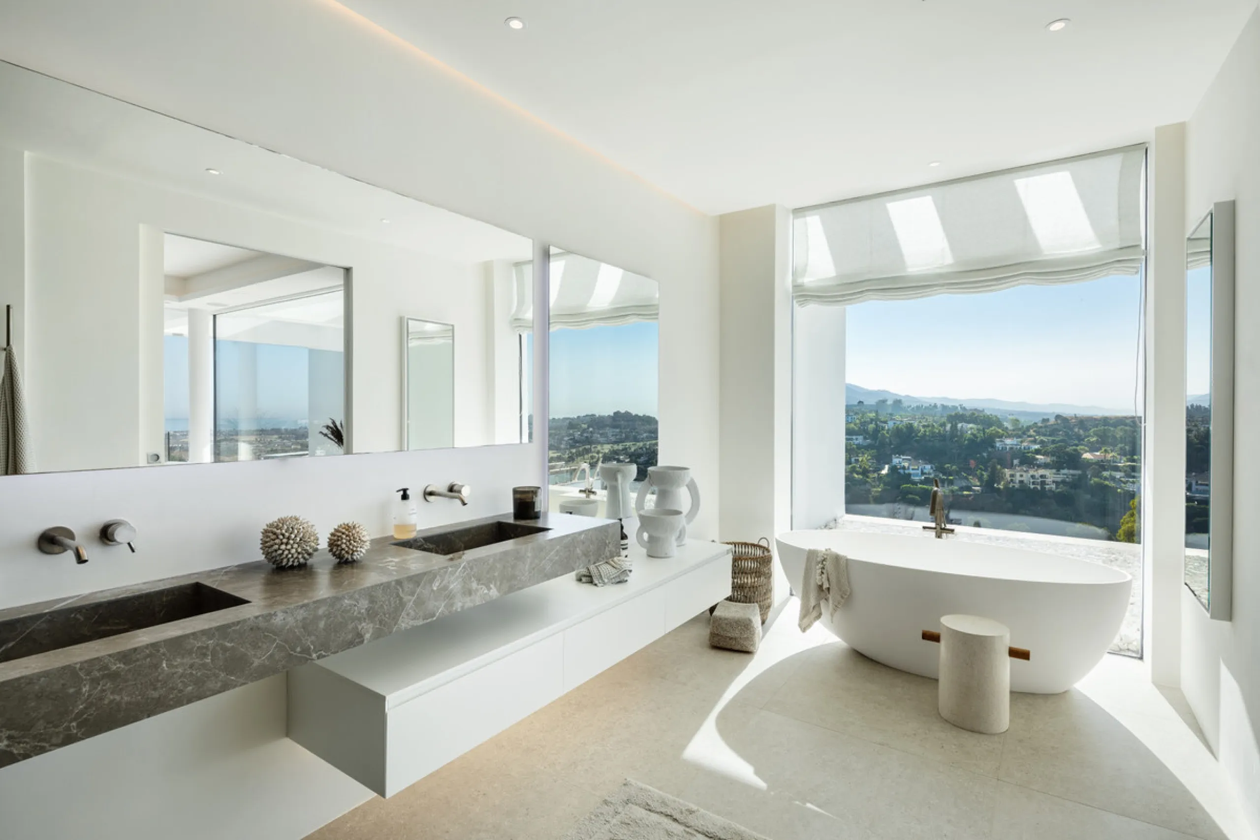 Nestled in the serene enclave of La Quinta, this contemporary villa, built in 2021, is designed to capture the essence of luxury living. South-facing, it offers stunning, sweeping views from the impressive La Concha Mountain to the Mediterranean Sea and e