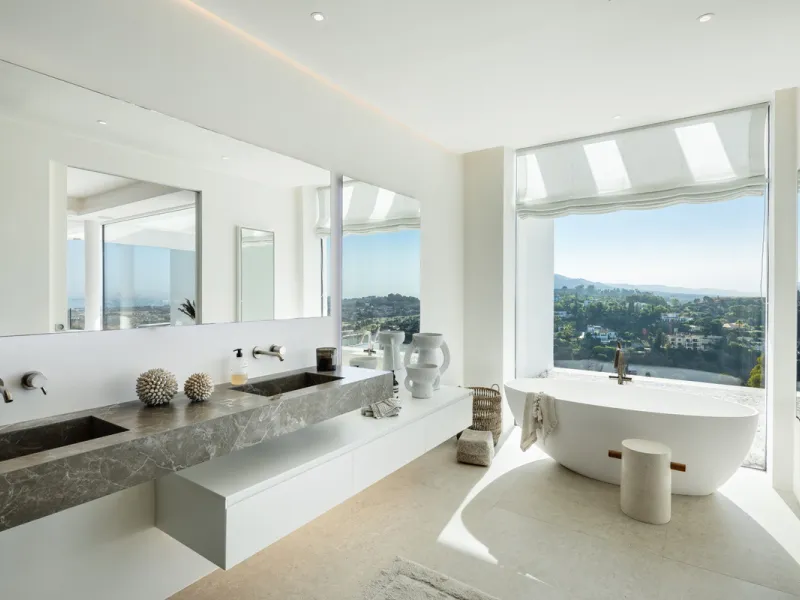 Nestled in the serene enclave of La Quinta, this contemporary villa, built in 2021, is designed to capture the essence of luxury living. South-facing, it offers stunning, sweeping views from the impressive La Concha Mountain to the Mediterranean Sea and e