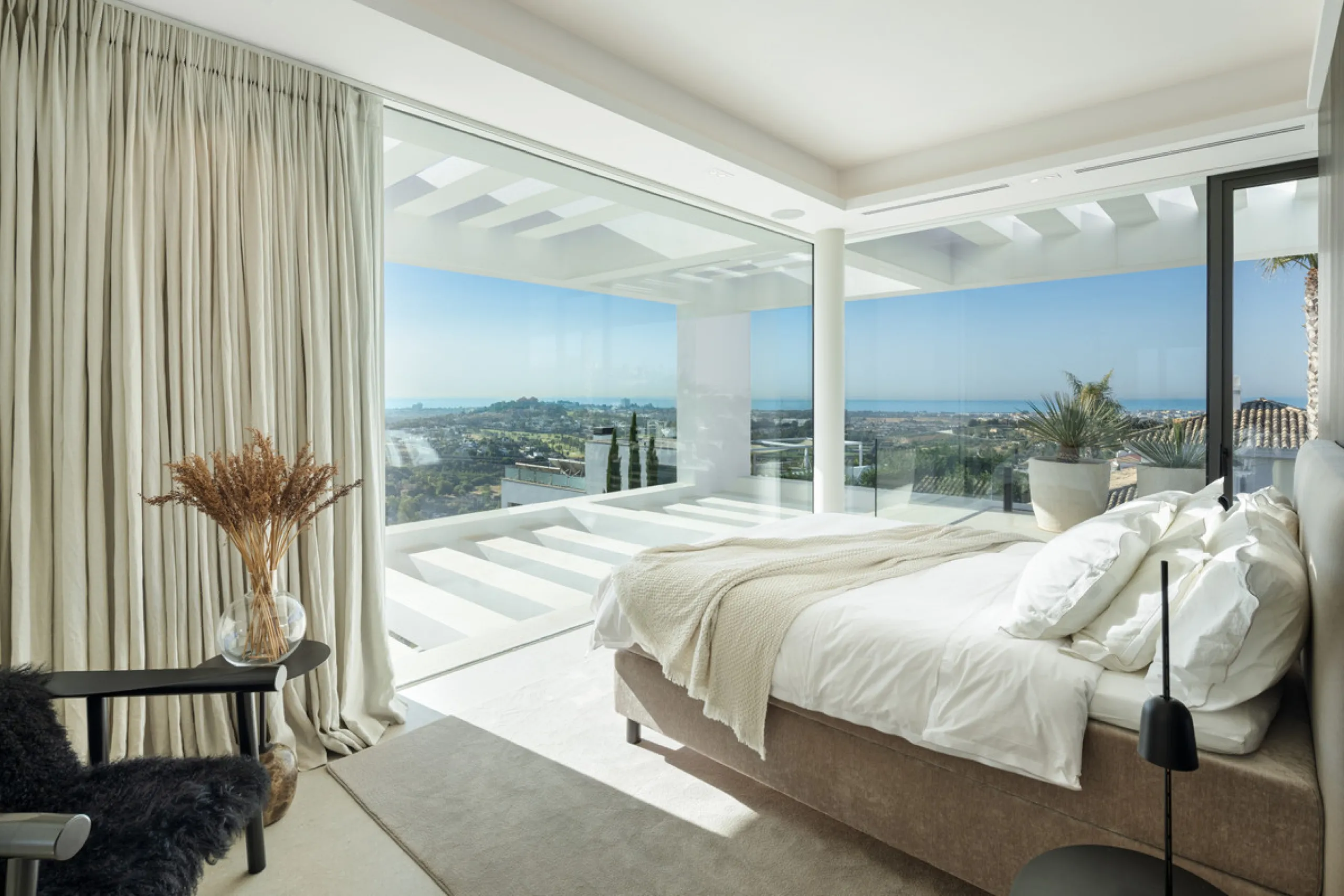 Nestled in the serene enclave of La Quinta, this contemporary villa, built in 2021, is designed to capture the essence of luxury living. South-facing, it offers stunning, sweeping views from the impressive La Concha Mountain to the Mediterranean Sea and e