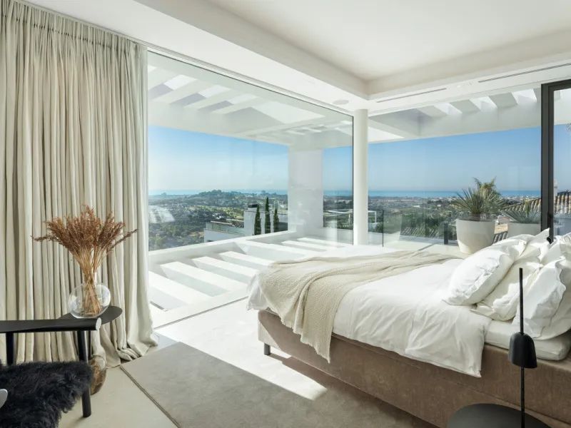 Nestled in the serene enclave of La Quinta, this contemporary villa, built in 2021, is designed to capture the essence of luxury living. South-facing, it offers stunning, sweeping views from the impressive La Concha Mountain to the Mediterranean Sea and e
