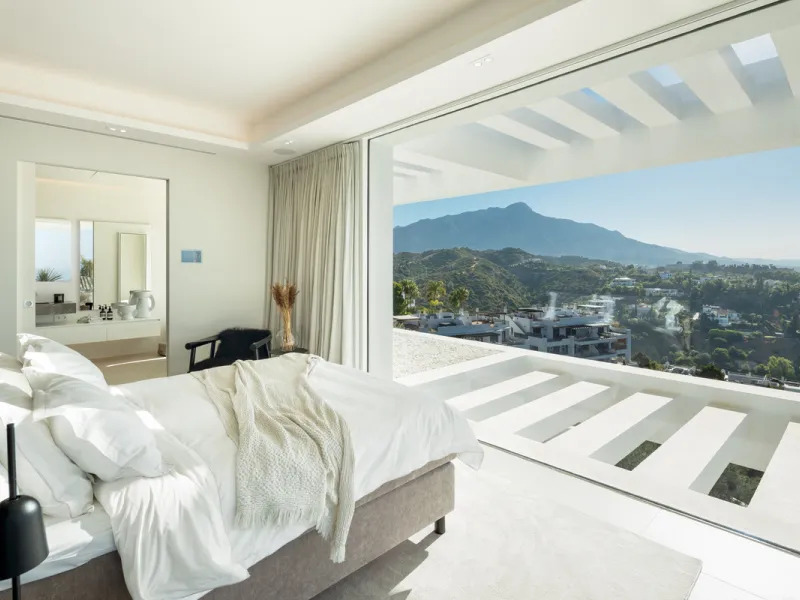 Nestled in the serene enclave of La Quinta, this contemporary villa, built in 2021, is designed to capture the essence of luxury living. South-facing, it offers stunning, sweeping views from the impressive La Concha Mountain to the Mediterranean Sea and e