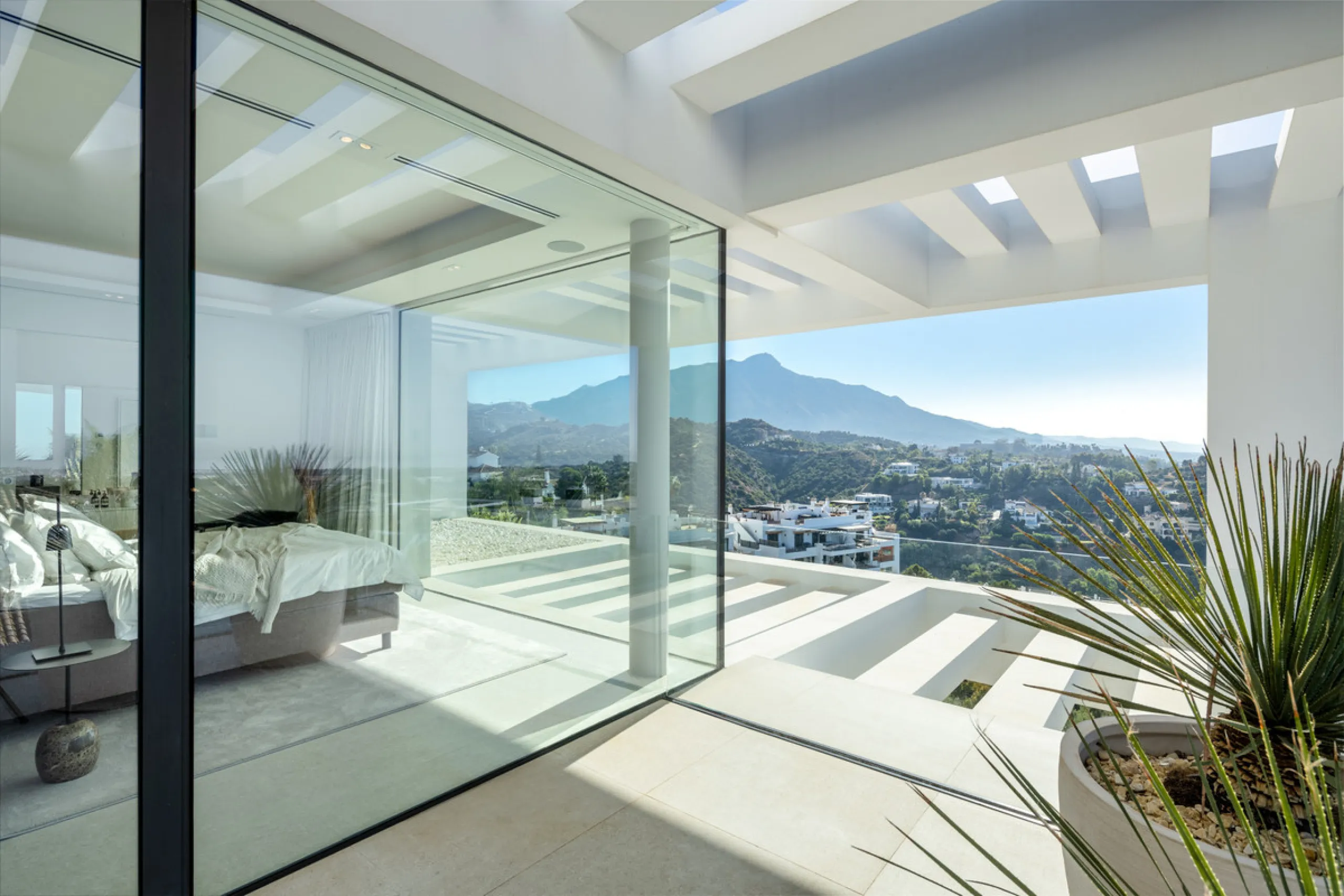 Nestled in the serene enclave of La Quinta, this contemporary villa, built in 2021, is designed to capture the essence of luxury living. South-facing, it offers stunning, sweeping views from the impressive La Concha Mountain to the Mediterranean Sea and e