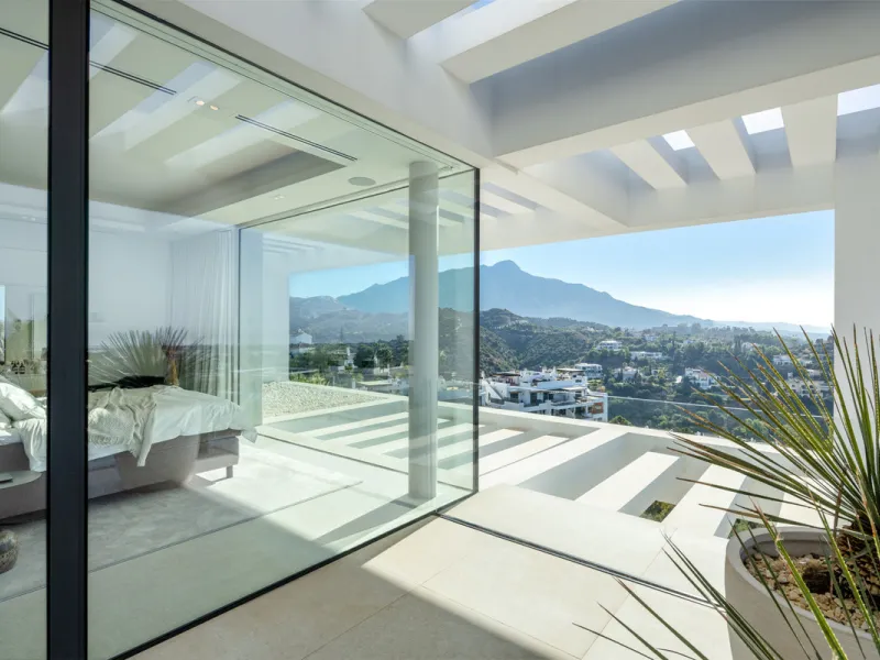 Nestled in the serene enclave of La Quinta, this contemporary villa, built in 2021, is designed to capture the essence of luxury living. South-facing, it offers stunning, sweeping views from the impressive La Concha Mountain to the Mediterranean Sea and e