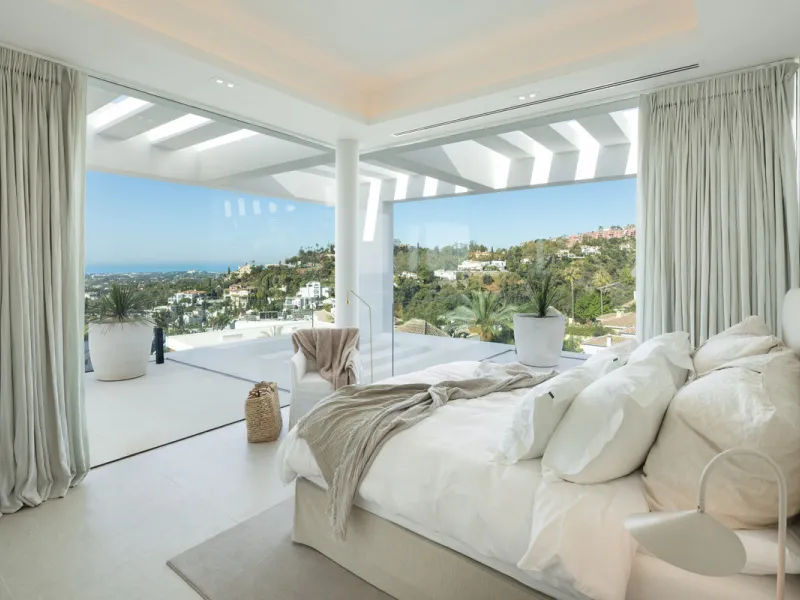 Nestled in the serene enclave of La Quinta, this contemporary villa, built in 2021, is designed to capture the essence of luxury living. South-facing, it offers stunning, sweeping views from the impressive La Concha Mountain to the Mediterranean Sea and e