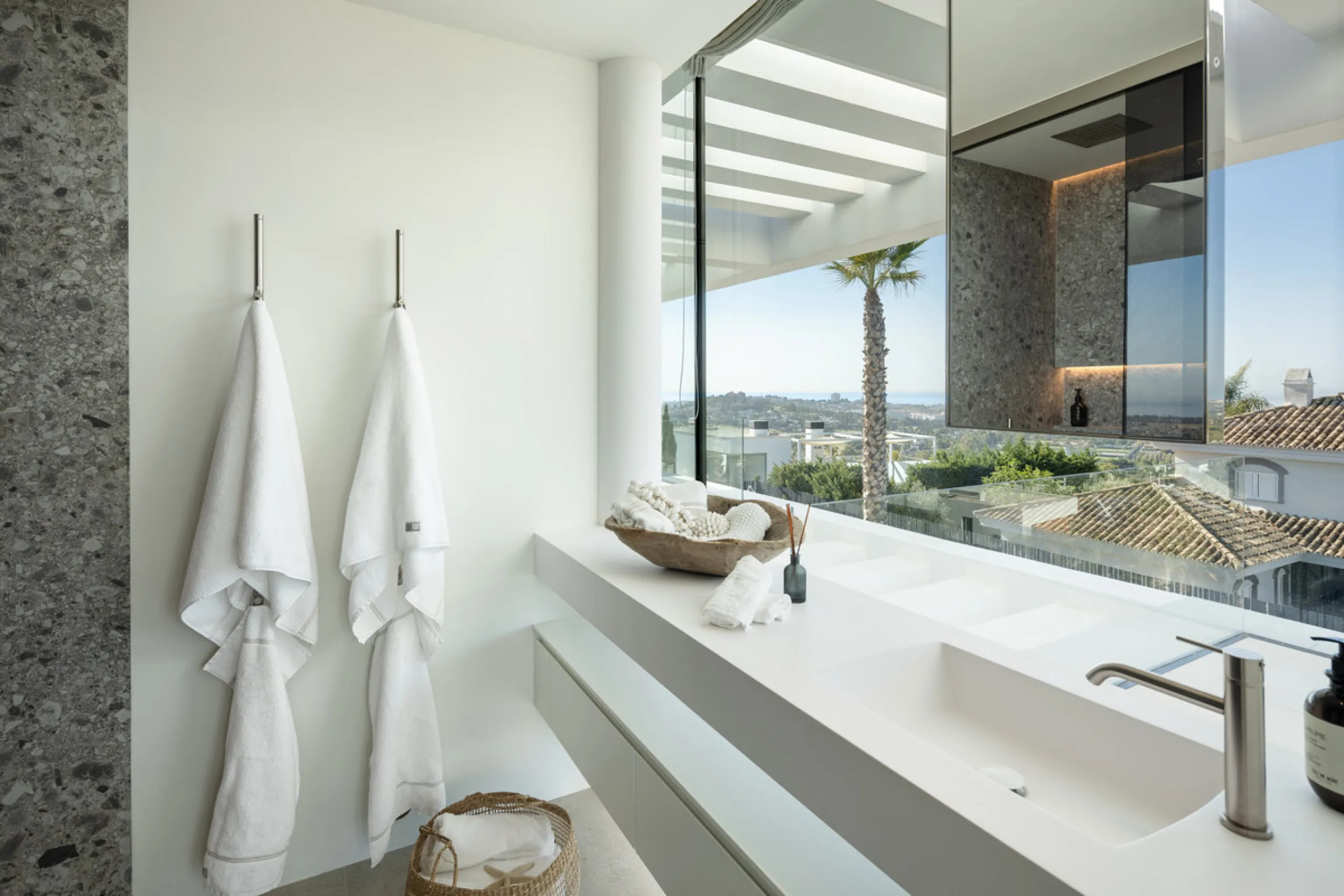 Nestled in the serene enclave of La Quinta, this contemporary villa, built in 2021, is designed to capture the essence of luxury living. South-facing, it offers stunning, sweeping views from the impressive La Concha Mountain to the Mediterranean Sea and e