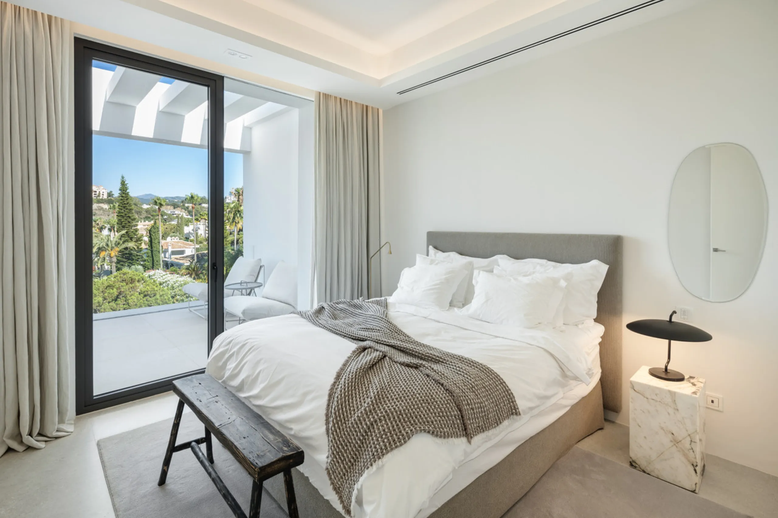 Nestled in the serene enclave of La Quinta, this contemporary villa, built in 2021, is designed to capture the essence of luxury living. South-facing, it offers stunning, sweeping views from the impressive La Concha Mountain to the Mediterranean Sea and e