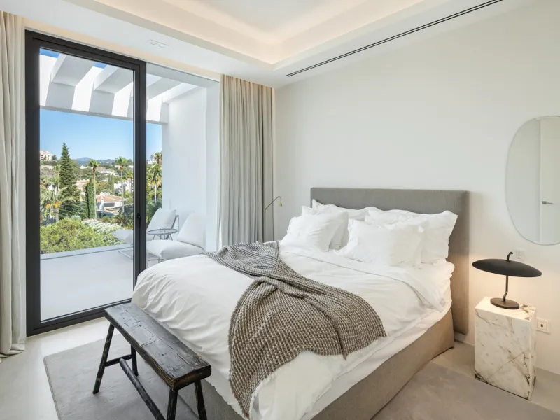 Nestled in the serene enclave of La Quinta, this contemporary villa, built in 2021, is designed to capture the essence of luxury living. South-facing, it offers stunning, sweeping views from the impressive La Concha Mountain to the Mediterranean Sea and e