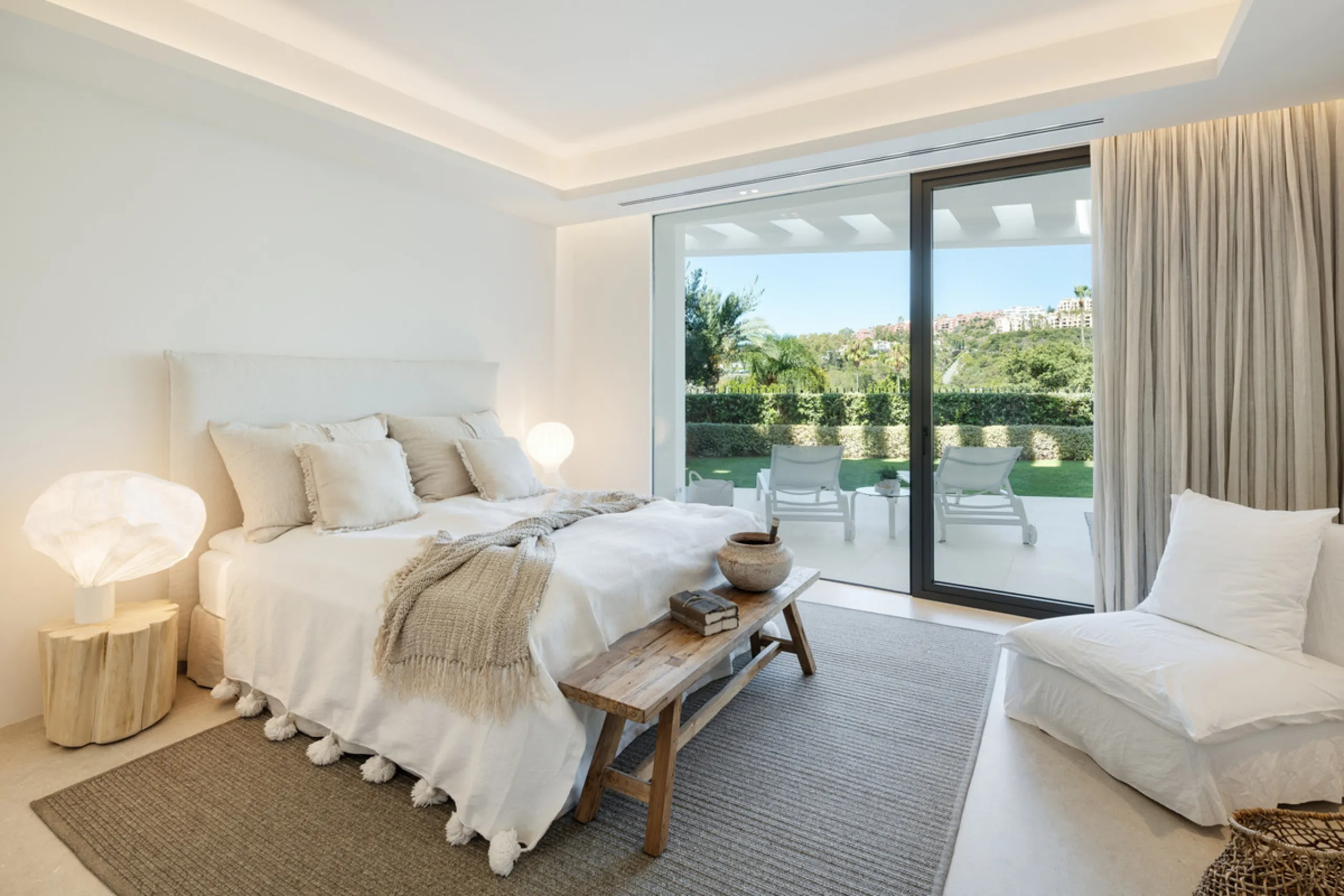 Nestled in the serene enclave of La Quinta, this contemporary villa, built in 2021, is designed to capture the essence of luxury living. South-facing, it offers stunning, sweeping views from the impressive La Concha Mountain to the Mediterranean Sea and e
