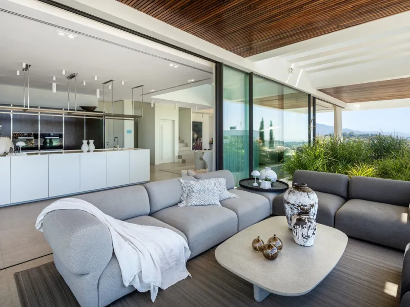 Nestled in the serene enclave of La Quinta, this contemporary villa, built in 2021, is designed to capture the essence of luxury living. South-facing, it offers stunning, sweeping views from the impressive La Concha Mountain to the Mediterranean Sea and e