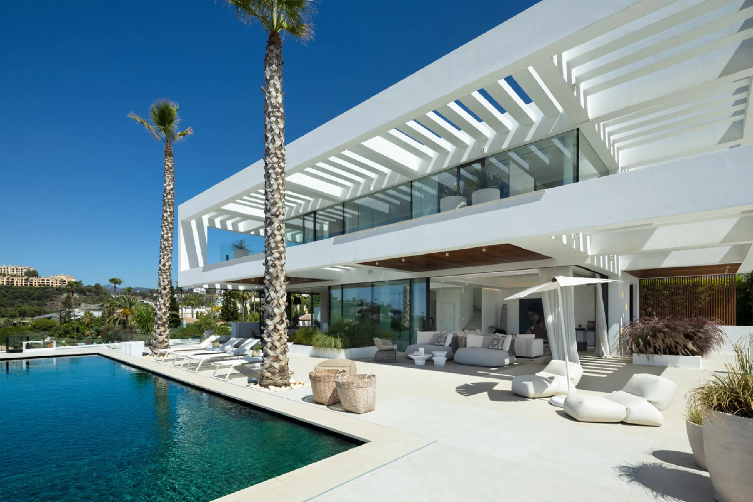 Nestled in the serene enclave of La Quinta, this contemporary villa, built in 2021, is designed to capture the essence of luxury living. South-facing, it offers stunning, sweeping views from the impressive La Concha Mountain to the Mediterranean Sea and e