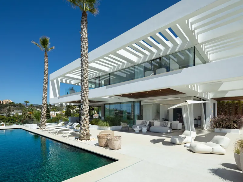 Nestled in the serene enclave of La Quinta, this contemporary villa, built in 2021, is designed to capture the essence of luxury living. South-facing, it offers stunning, sweeping views from the impressive La Concha Mountain to the Mediterranean Sea and e