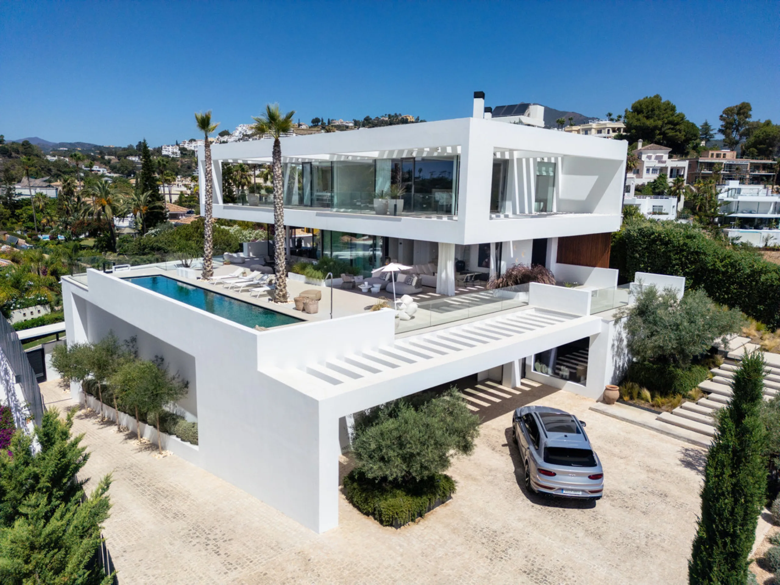 Nestled in the serene enclave of La Quinta, this contemporary villa, built in 2021, is designed to capture the essence of luxury living. South-facing, it offers stunning, sweeping views from the impressive La Concha Mountain to the Mediterranean Sea and e