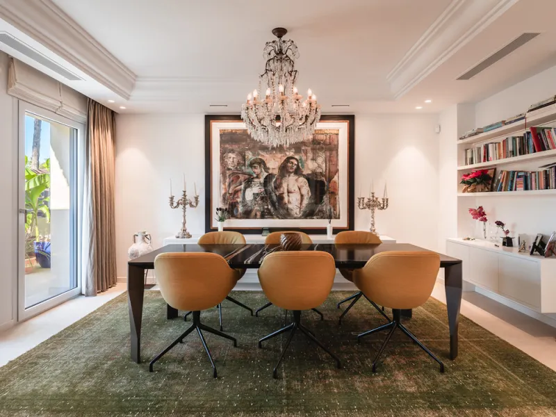 This exceptional and exquisitely designed southwest-facing duplex penthouse offers a stunning panoramic view of the award-winning gardens of Las Alamandas, in Nueva Andalucía, providing an ideal balance of sun and shade across its expansive terrace spaces