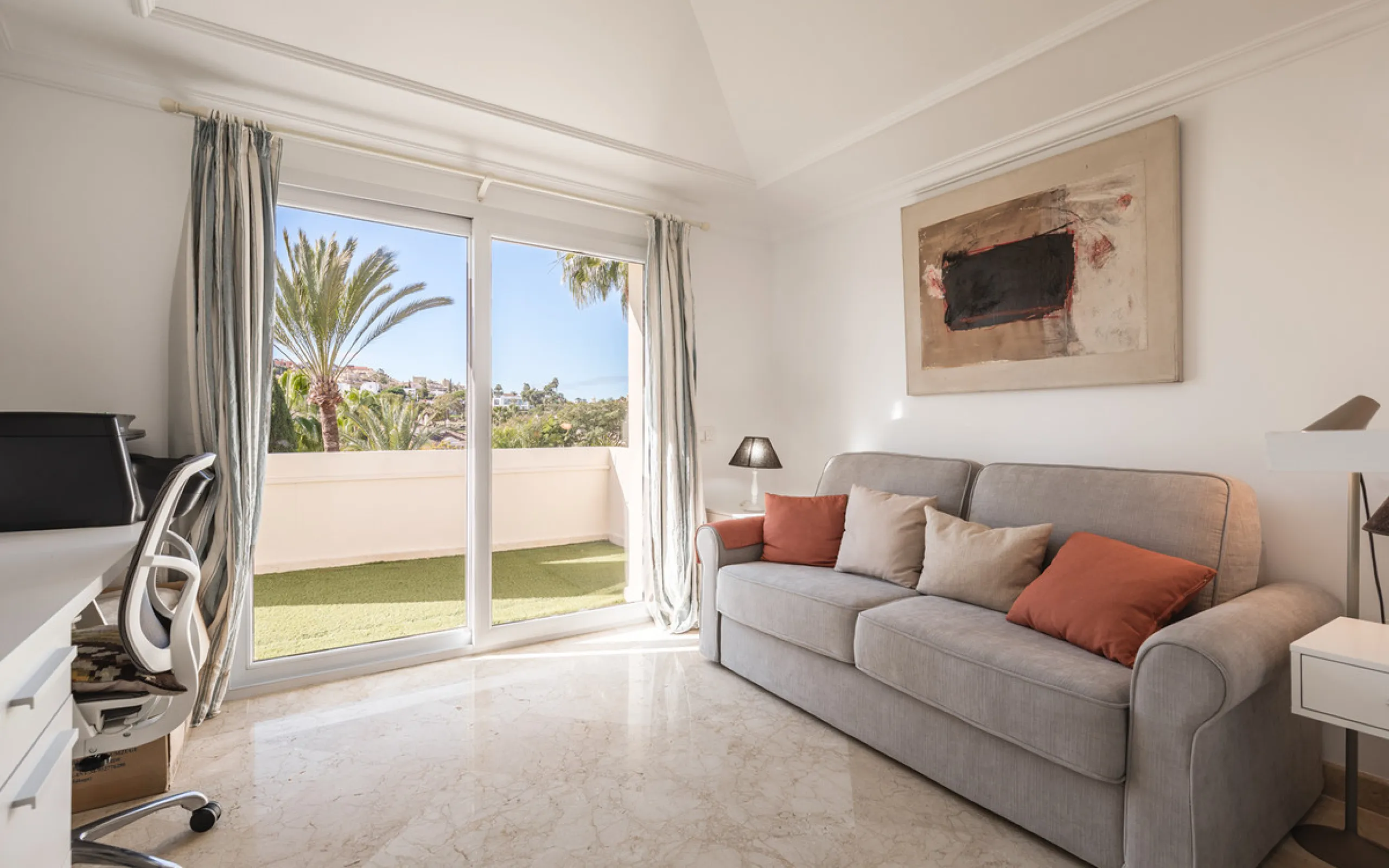 This exceptional and exquisitely designed southwest-facing duplex penthouse offers a stunning panoramic view of the award-winning gardens of Las Alamandas, in Nueva Andalucía, providing an ideal balance of sun and shade across its expansive terrace spaces