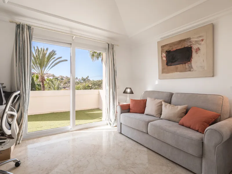 This exceptional and exquisitely designed southwest-facing duplex penthouse offers a stunning panoramic view of the award-winning gardens of Las Alamandas, in Nueva Andalucía, providing an ideal balance of sun and shade across its expansive terrace spaces