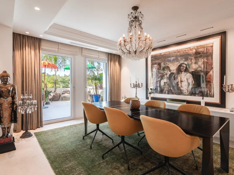 This exceptional and exquisitely designed southwest-facing duplex penthouse offers a stunning panoramic view of the award-winning gardens of Las Alamandas, in Nueva Andalucía, providing an ideal balance of sun and shade across its expansive terrace spaces
