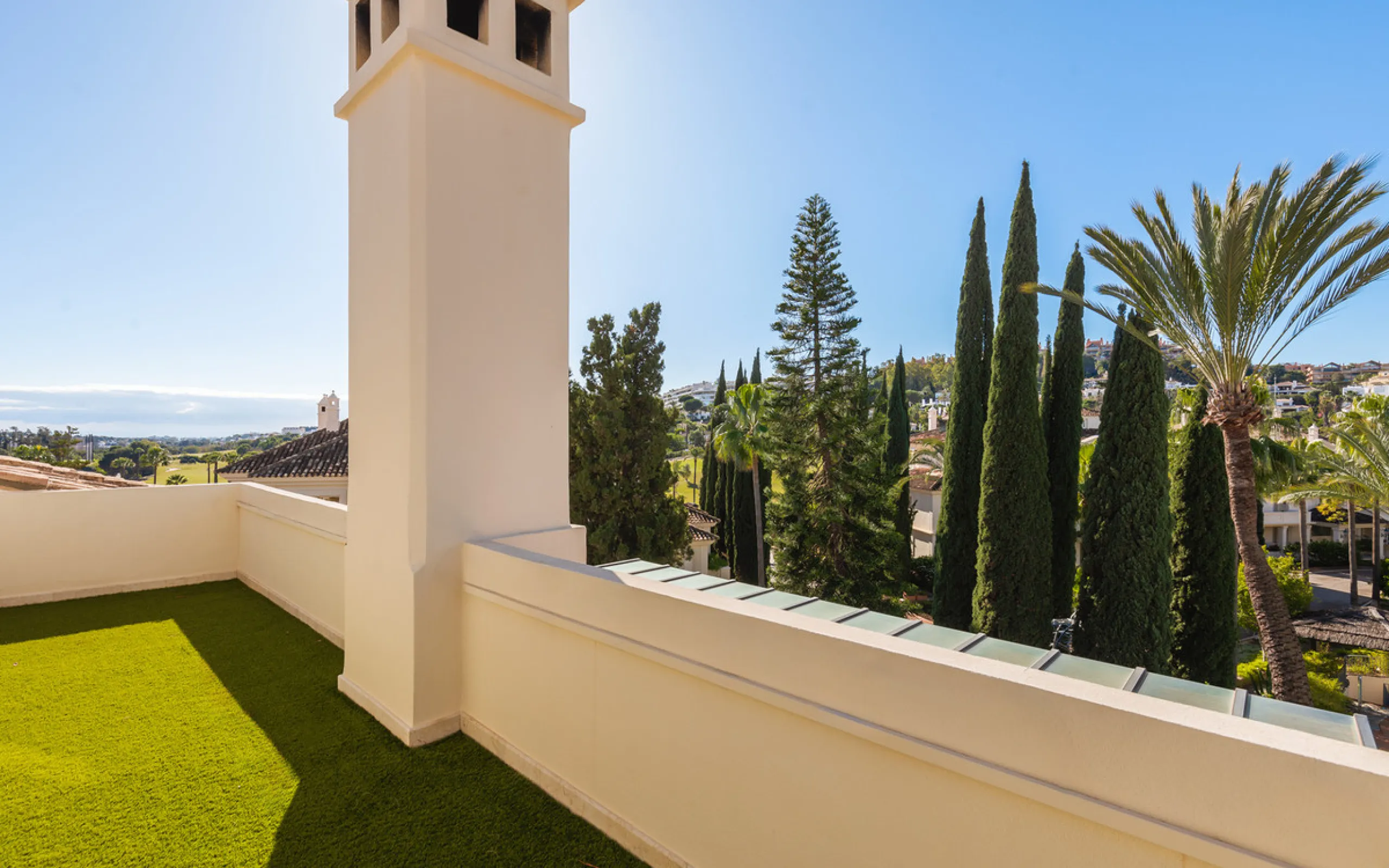 This exceptional and exquisitely designed southwest-facing duplex penthouse offers a stunning panoramic view of the award-winning gardens of Las Alamandas, in Nueva Andalucía, providing an ideal balance of sun and shade across its expansive terrace spaces