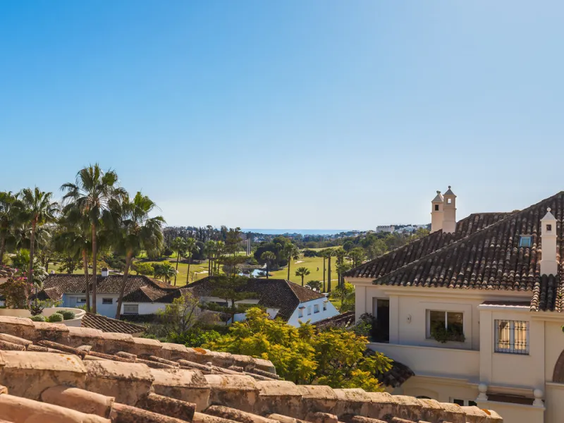 This exceptional and exquisitely designed southwest-facing duplex penthouse offers a stunning panoramic view of the award-winning gardens of Las Alamandas, in Nueva Andalucía, providing an ideal balance of sun and shade across its expansive terrace spaces