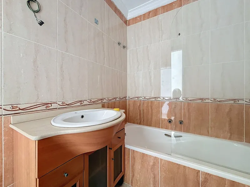 A complete block of homes located in Algarrobo Pueblo is offered for sale, consisting of three floors with three independent apartments, ideal for both investment and family residential use. On the first floor is the first apartment, which has a living ro