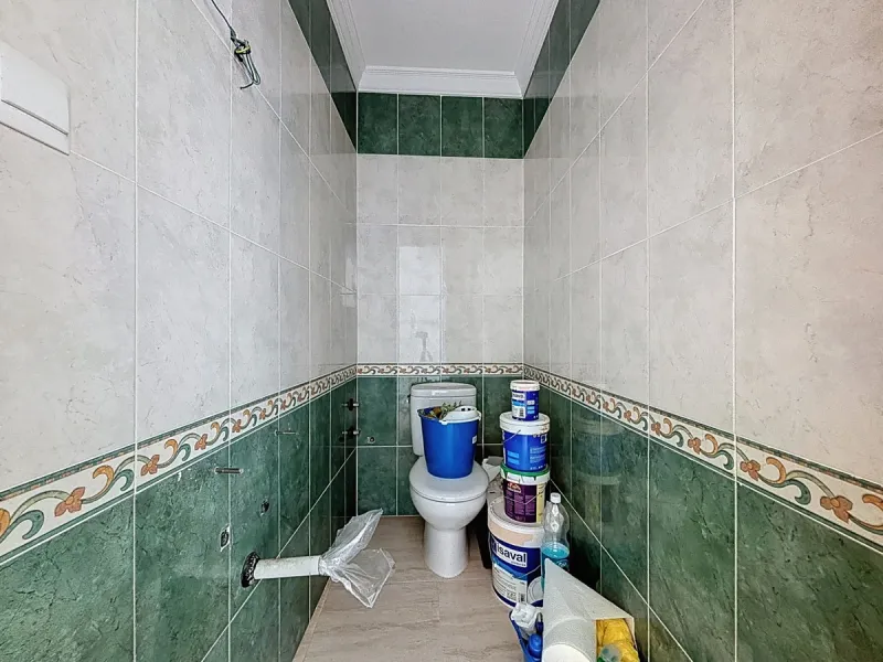 A complete block of homes located in Algarrobo Pueblo is offered for sale, consisting of three floors with three independent apartments, ideal for both investment and family residential use. On the first floor is the first apartment, which has a living ro