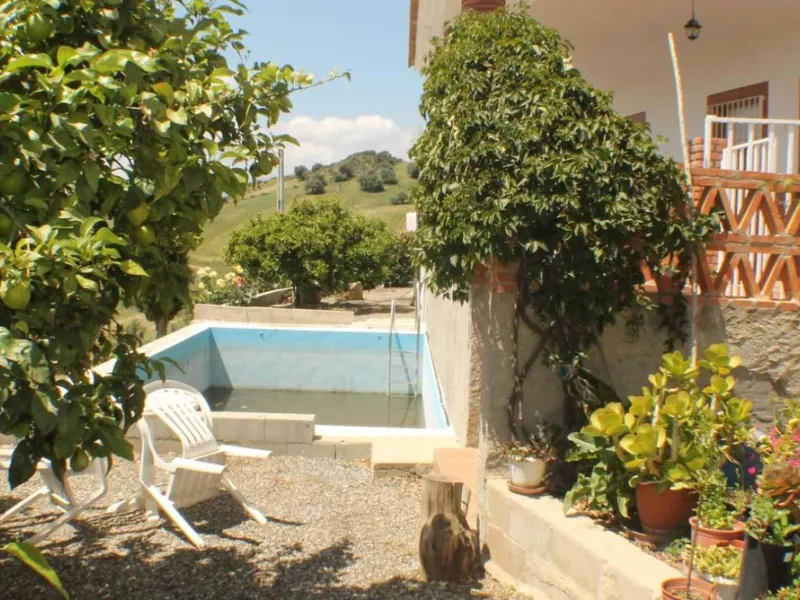 This charming finca-style cortijo is set in the heart of nature near the mountain village of Gibralgalia, in the Guadalhorce Valley inland from Málaga. Renovated and well maintained, the property offers exceptional tranquility along with open panoramic vi