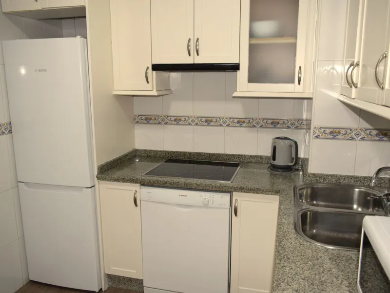 We are offering this magnificent apartment with a Tourist License for sale. It is located at Avenida La Rosaleda 21, next to the river. The apartment is fully furnished and decorated with the latest trends. It is a first-floor apartment with a south-facin
