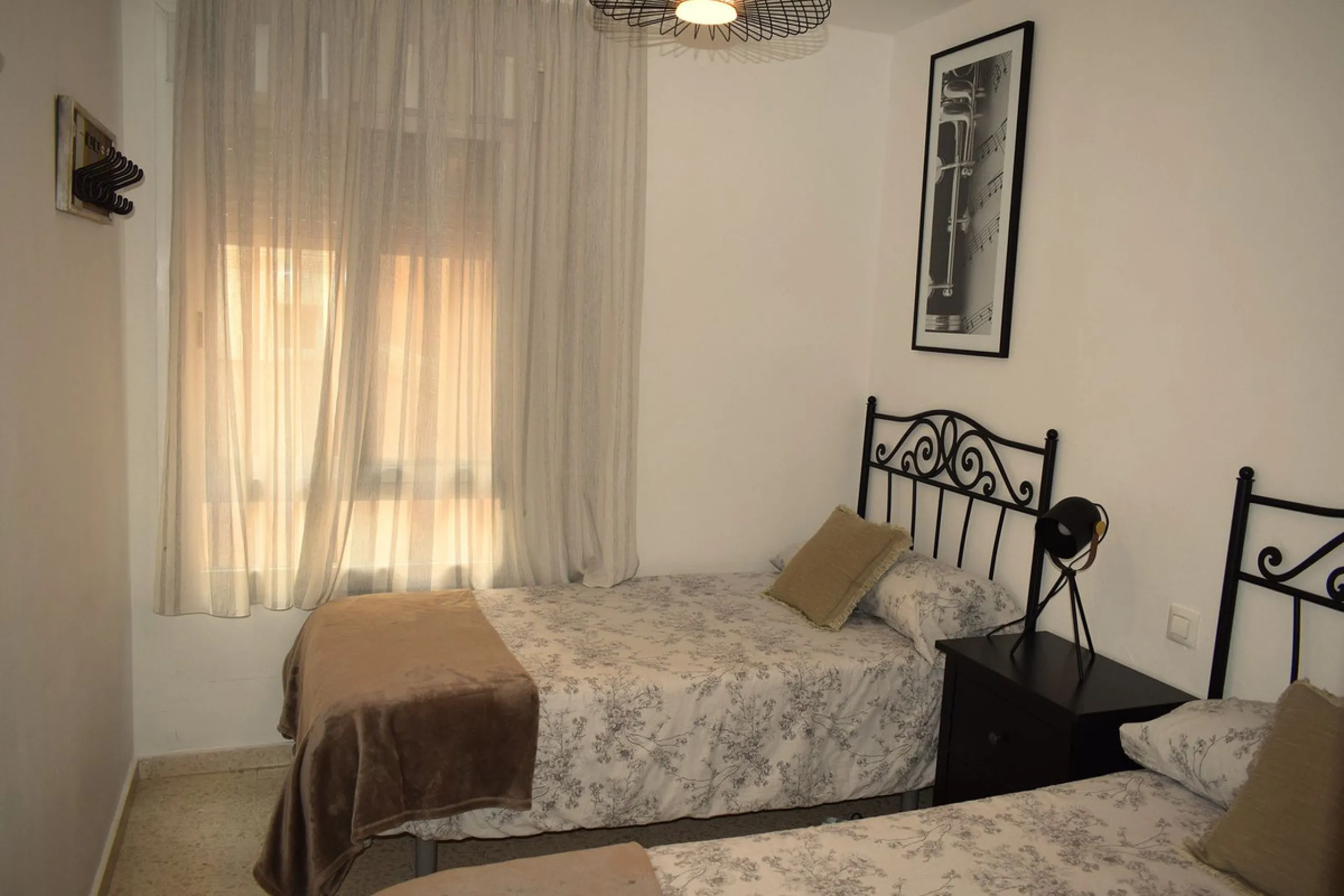 We are offering this magnificent apartment with a Tourist License for sale. It is located at Avenida La Rosaleda 21, next to the river. The apartment is fully furnished and decorated with the latest trends. It is a first-floor apartment with a south-facin