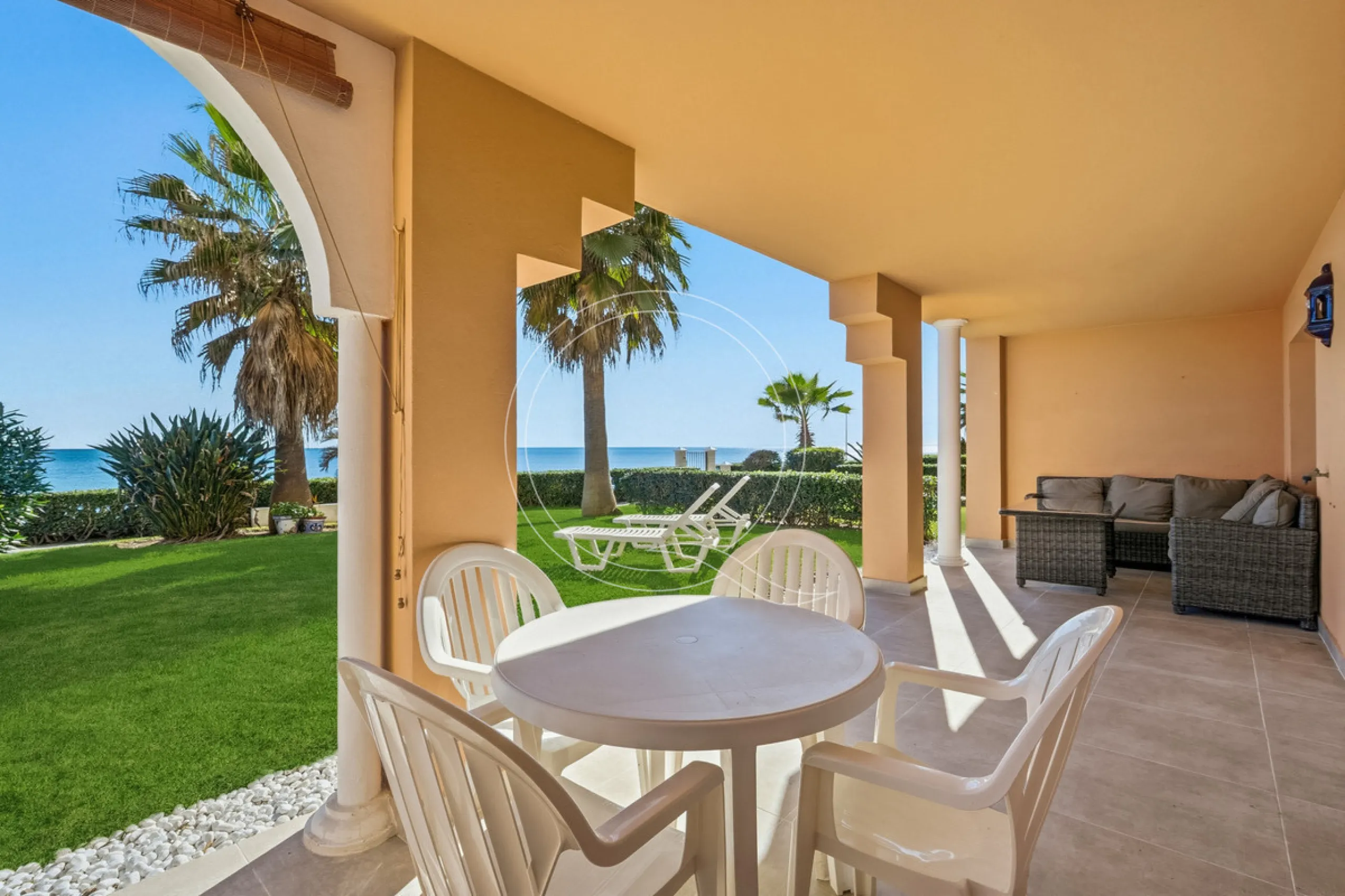 Located in a prestigious front-line beach complex just west of Estepona, this three-bedroom ground-floor apartment offers an exceptional blend of coastal comfort and relaxed Mediterranean living. With direct access to the garden and just steps from the sa