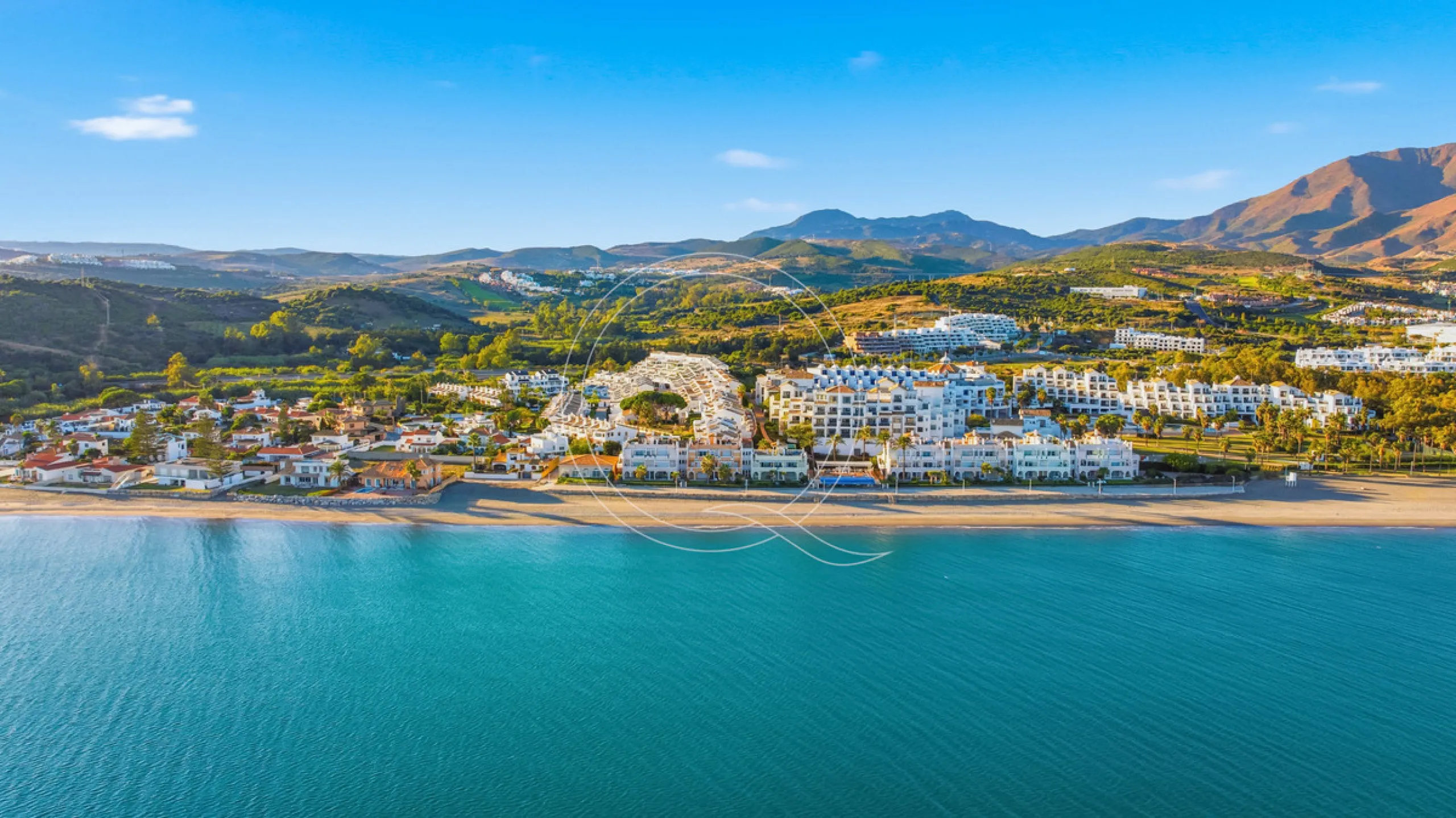 Located in a prestigious front-line beach complex just west of Estepona, this three-bedroom ground-floor apartment offers an exceptional blend of coastal comfort and relaxed Mediterranean living. With direct access to the garden and just steps from the sa
