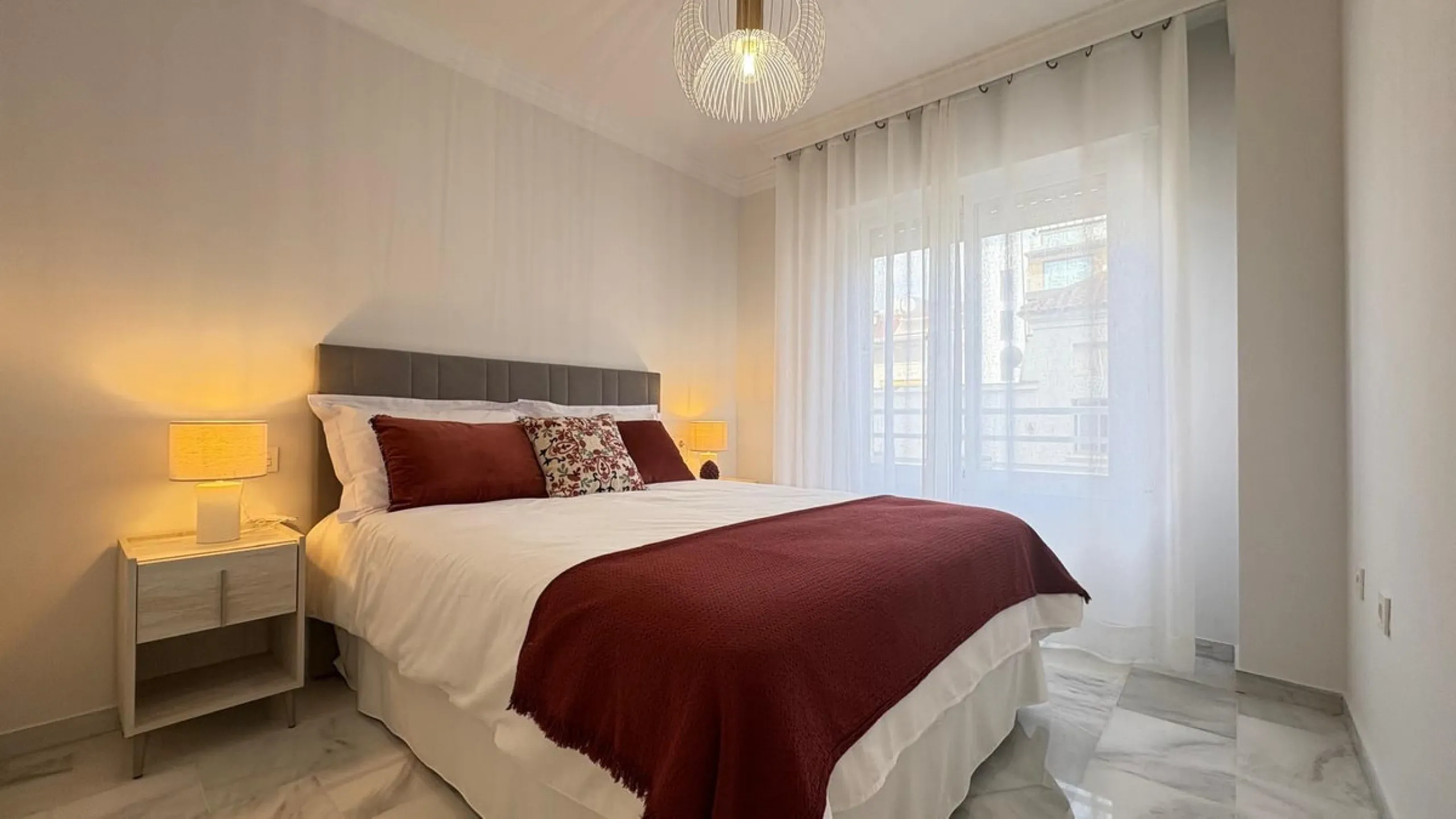 This beautifully renovated middle-floor apartment is located in one of Marbella's most sought-after areas, right in the heart of the center and just steps from the beach. Positioned on the second line of the beachfront near the lighthouse, it offers the p