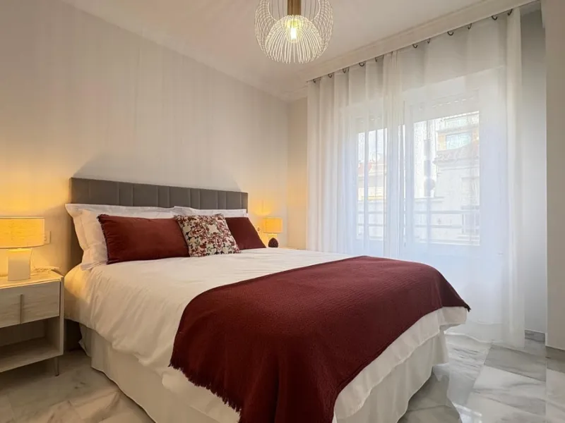 This beautifully renovated middle-floor apartment is located in one of Marbella's most sought-after areas, right in the heart of the center and just steps from the beach. Positioned on the second line of the beachfront near the lighthouse, it offers the p