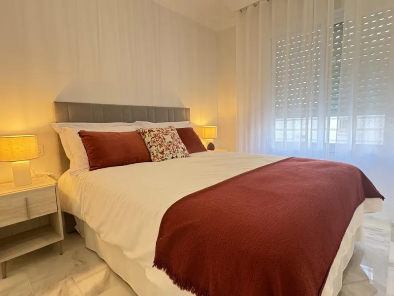 This beautifully renovated middle-floor apartment is located in one of Marbella's most sought-after areas, right in the heart of the center and just steps from the beach. Positioned on the second line of the beachfront near the lighthouse, it offers the p