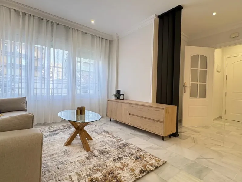 This beautifully renovated middle-floor apartment is located in one of Marbella's most sought-after areas, right in the heart of the center and just steps from the beach. Positioned on the second line of the beachfront near the lighthouse, it offers the p