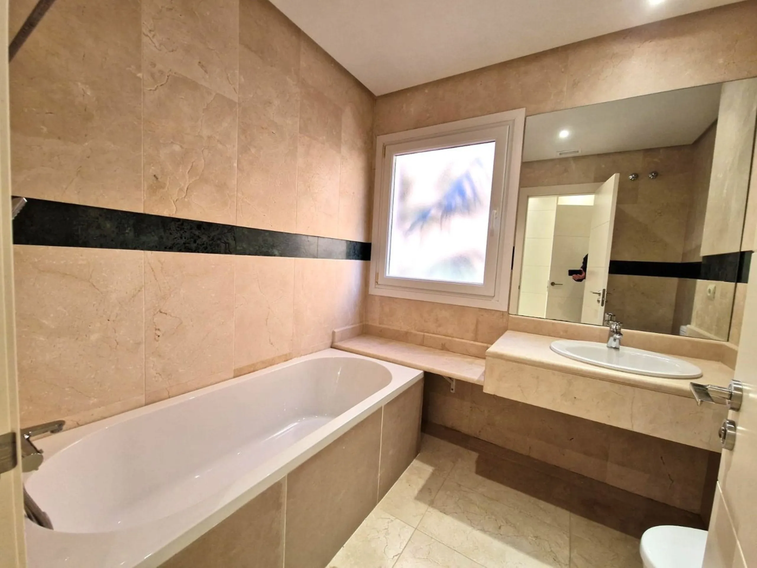 Stunning Corner Ground-Floor Apartment in Nueva Andalucía – Marbella's Golf Valley Gem