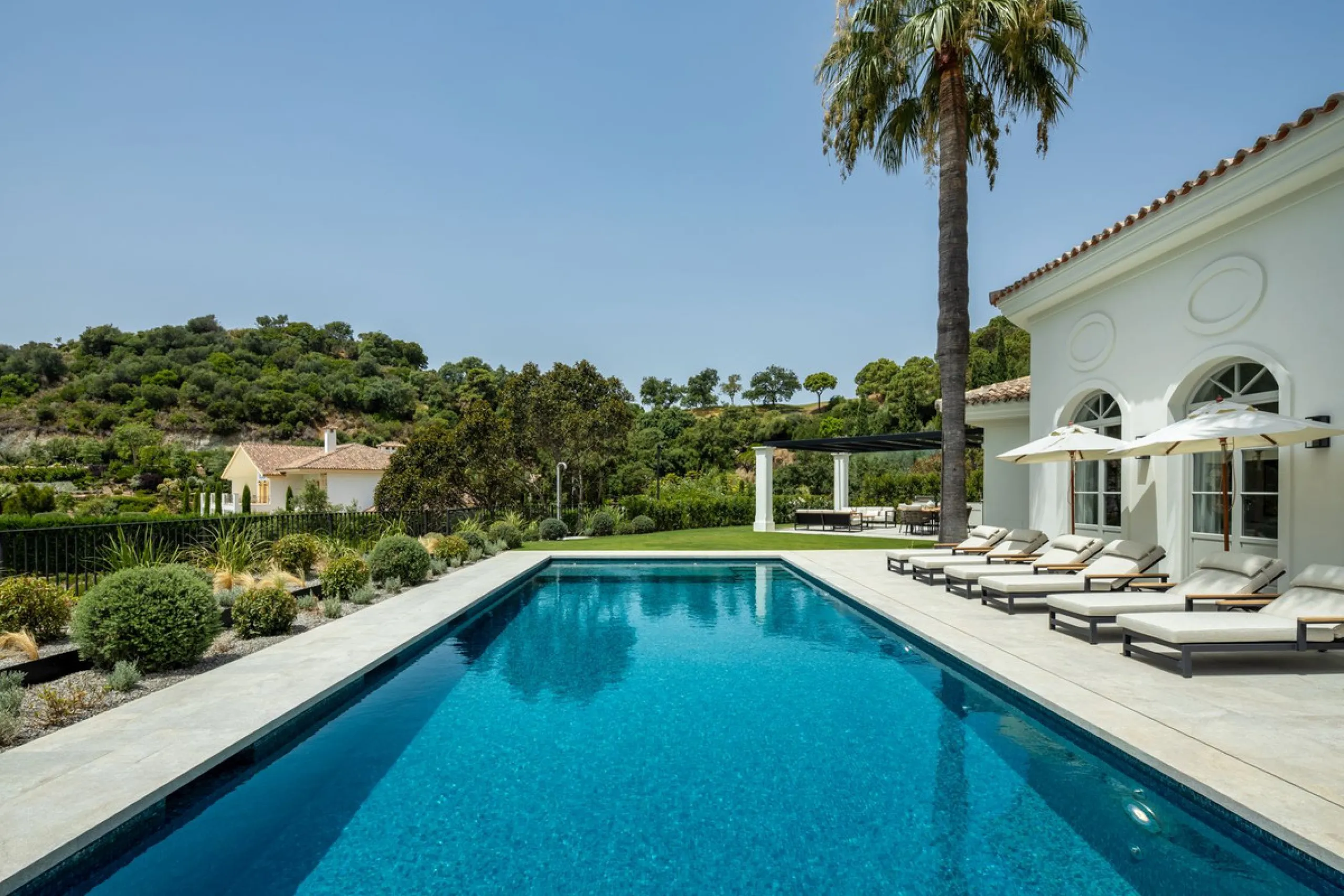 This exceptional five-bedroom luxury villa for sale is located within the prestigious gated community of La Zagaleta, in Benahavís. Newly completed by the acclaimed architectural studio Puroform, the property showcases a refined blend of contemporary desi