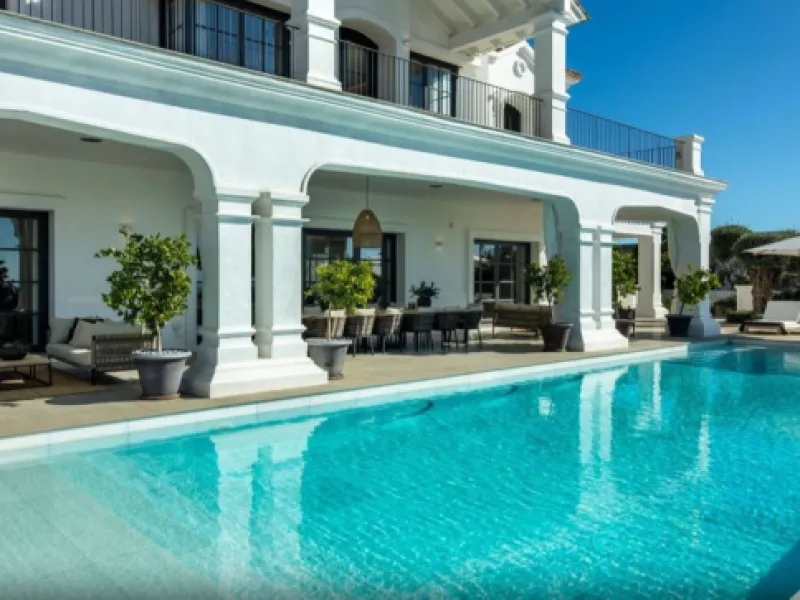 Set within the prestigious, 24-hour secure enclave of the Marbella Club Golf Resort, this Andalusian-inspired yet contemporary mansion offers an extraordinary fusion of timeless elegance and modern luxury. The exclusive resort is home to an exceptional 18