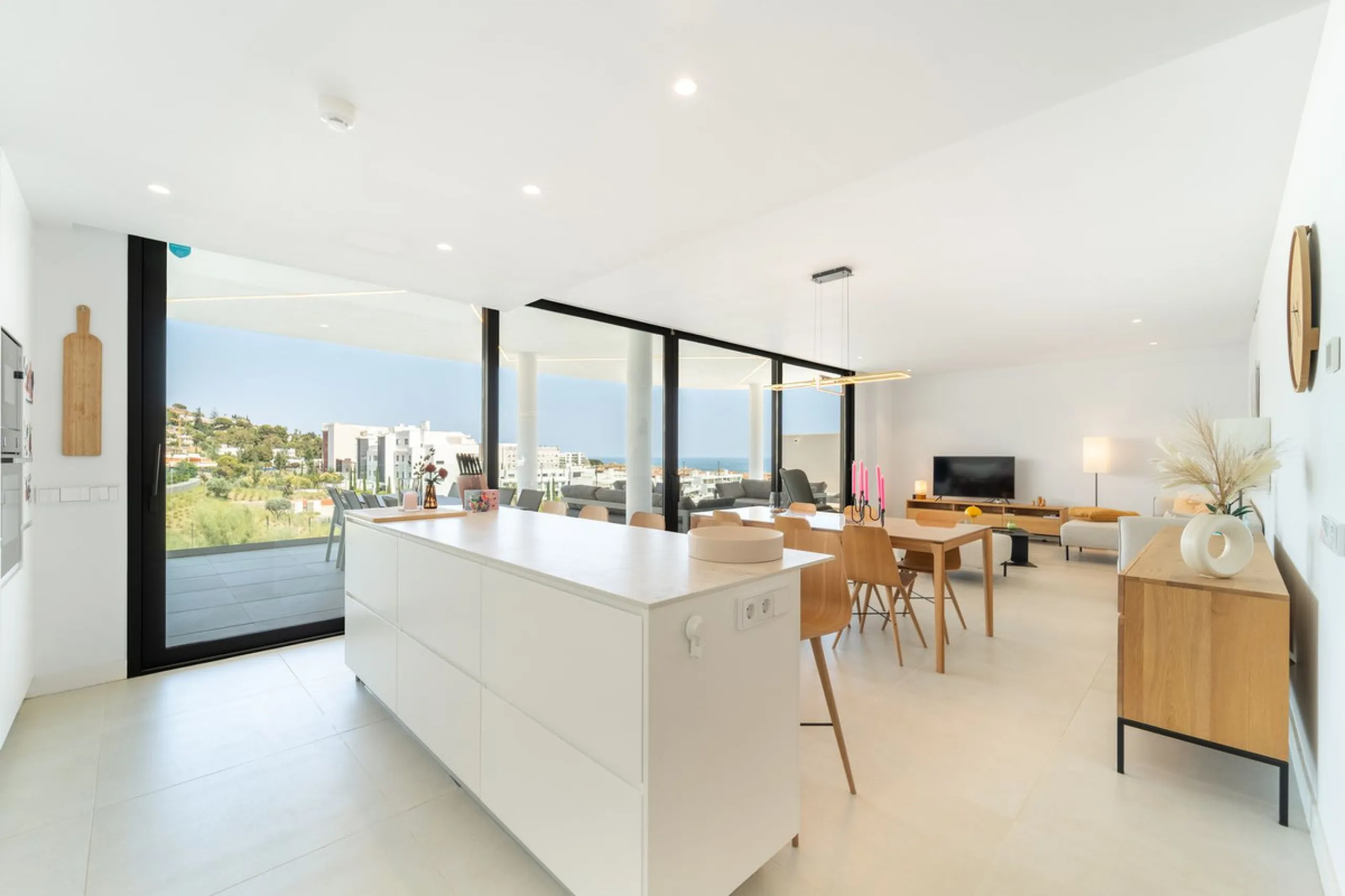 This exceptional ground-floor apartment offers a rare combination of space, privacy, and open views within a secure and highly sought-after residential setting on the Costa del Sol. The property enjoys uninterrupted views over a protected green zone and w