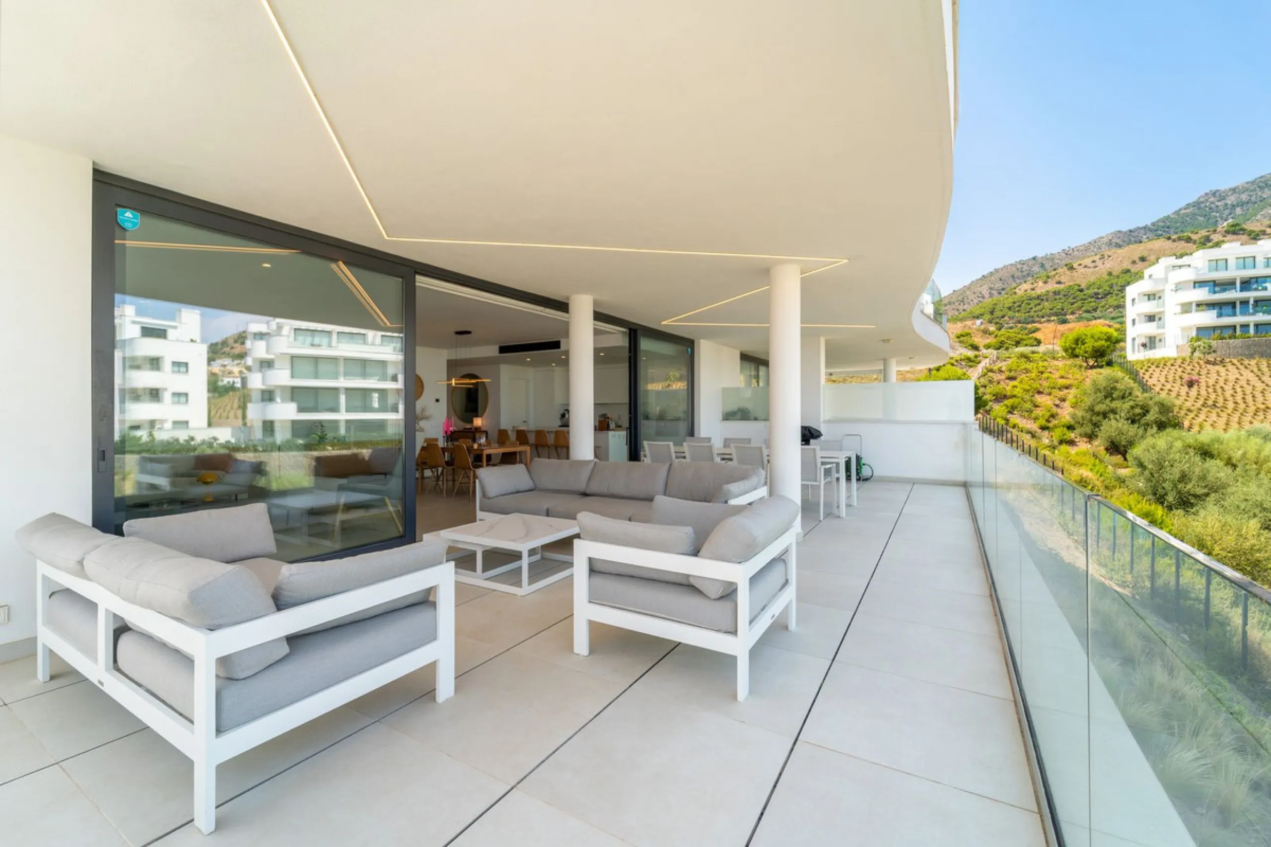 This exceptional ground-floor apartment offers a rare combination of space, privacy, and open views within a secure and highly sought-after residential setting on the Costa del Sol. The property enjoys uninterrupted views over a protected green zone and w