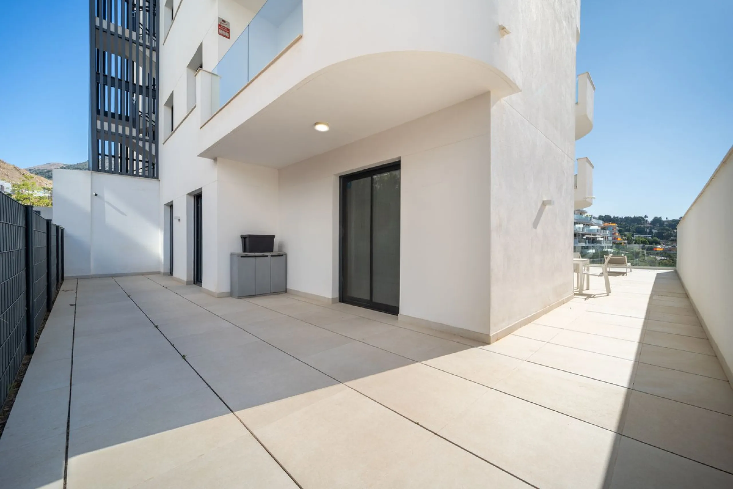 This exceptional ground-floor apartment offers a rare combination of space, privacy, and open views within a secure and highly sought-after residential setting on the Costa del Sol. The property enjoys uninterrupted views over a protected green zone and w