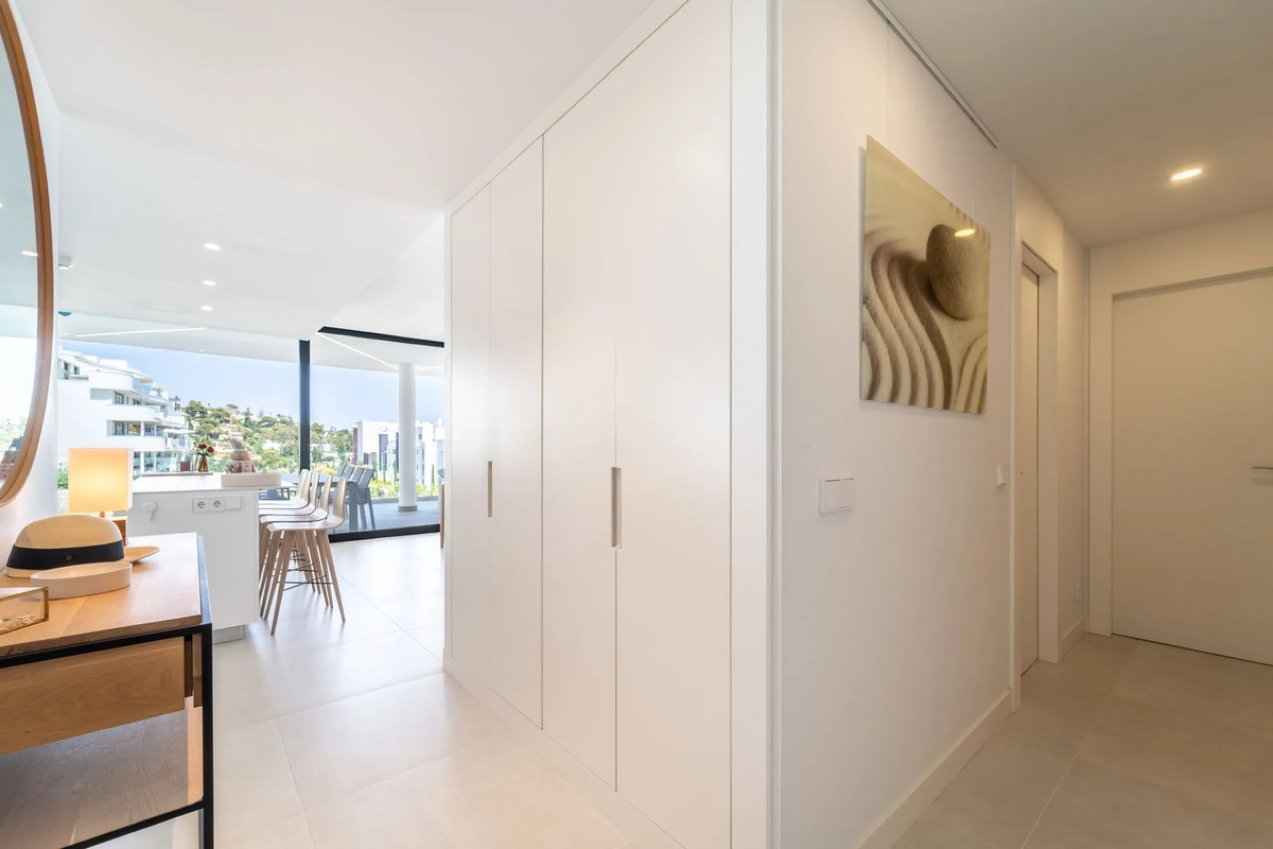 This exceptional ground-floor apartment offers a rare combination of space, privacy, and open views within a secure and highly sought-after residential setting on the Costa del Sol. The property enjoys uninterrupted views over a protected green zone and w