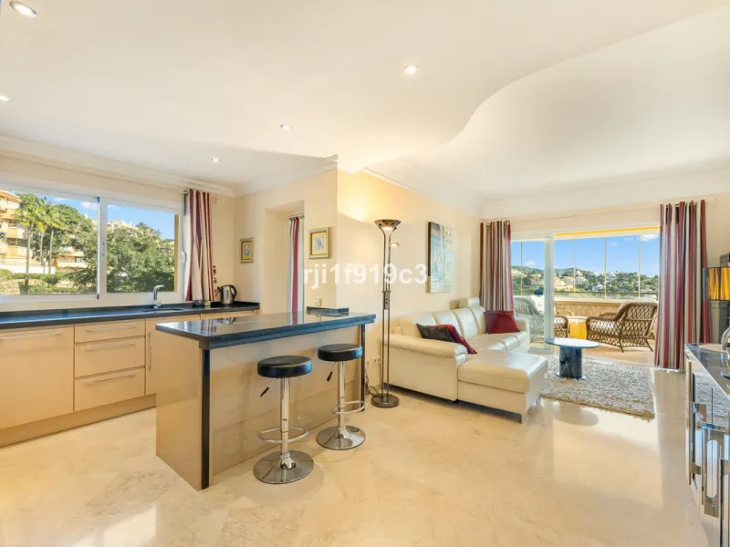 Discover a truly exceptional home in the prestigious Elviria Hills complex. Originally a two-bedroom apartment, converted into a modern three-bedroom property that combines contemporary design, comfort, and some of the best panoramic sea views in the area