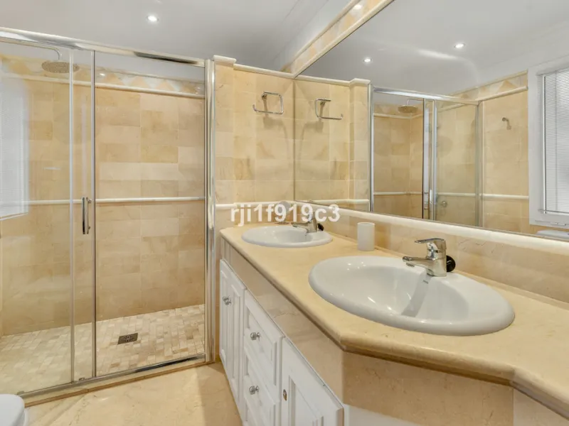 Discover a truly exceptional home in the prestigious Elviria Hills complex. Originally a two-bedroom apartment, converted into a modern three-bedroom property that combines contemporary design, comfort, and some of the best panoramic sea views in the area