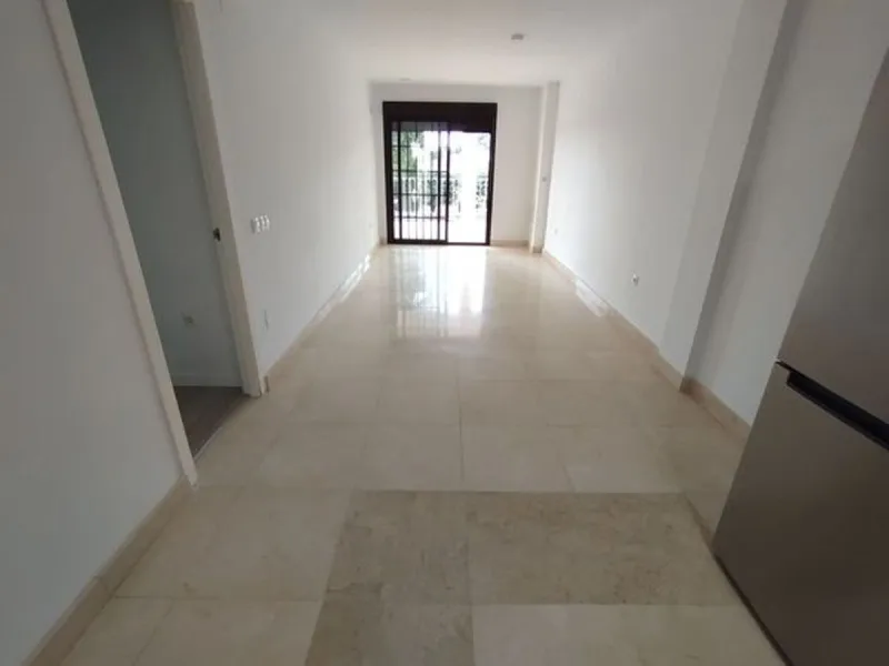 APARTMENT FOR SALE IN BENALMÁDENA – UNOBSTRUCTED VIEWS AND 2 PARKING SPACES
