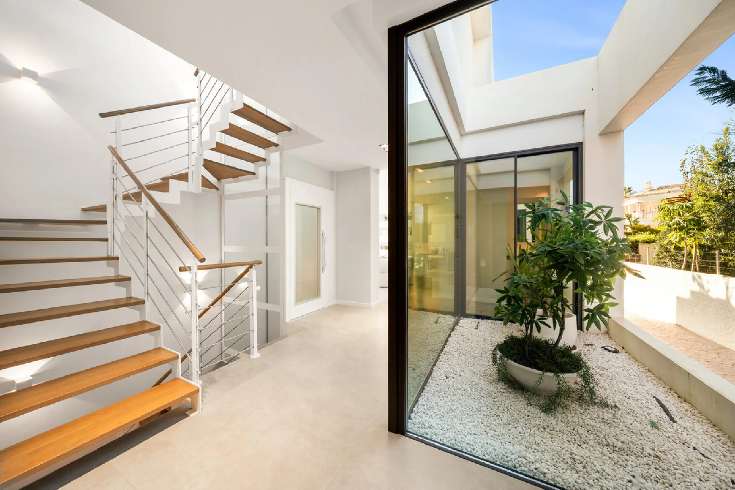 Boasting of panoramic sea views, a contemporary showpiece villa sitting in a privileged beachfront position in the New Golden Mile, surrounded by an expansive private garden with a large private swimming pool. The ideal family estate offering a dynamic ou
